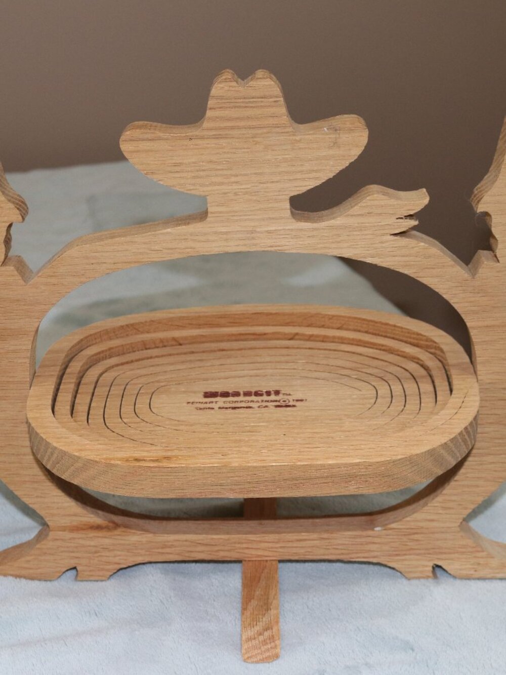 Feinart Corporation wood carved fruit bowl.